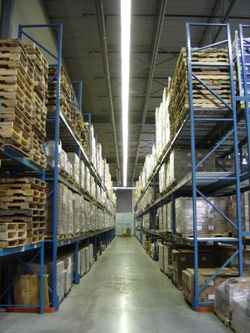 Aisle with pallets on storage racks